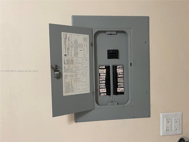 utility room featuring electric panel