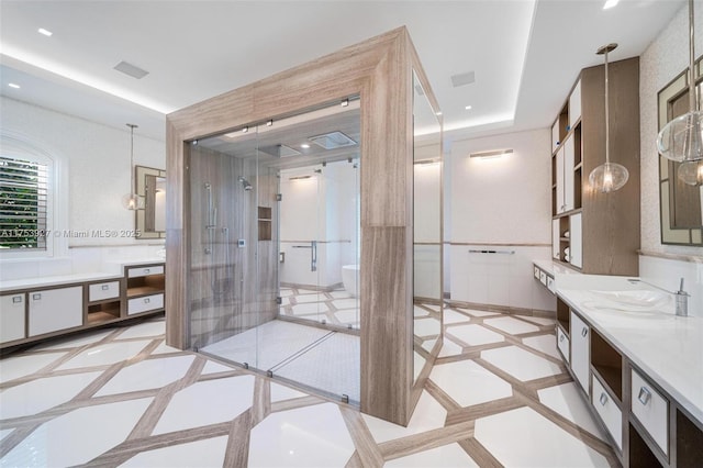 bathroom featuring recessed lighting, a soaking tub, a shower stall, and vanity