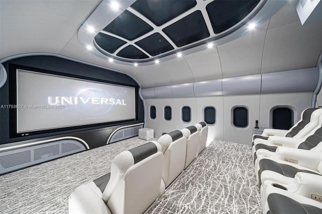 home theater featuring coffered ceiling and lofted ceiling