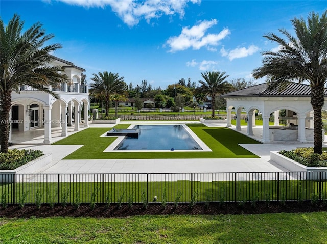 view of swimming pool with a gazebo, a lawn, a patio, and fence private yard