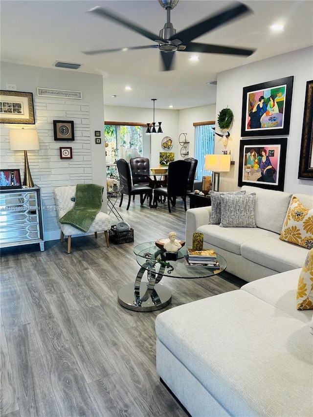 living room featuring visible vents, recessed lighting, ceiling fan, and wood finished floors