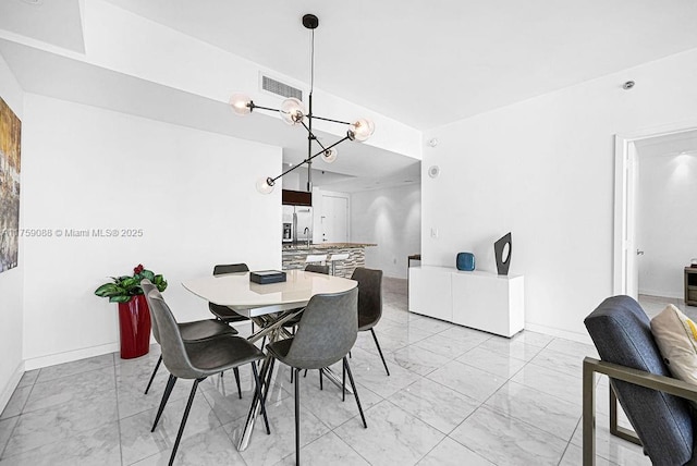 950 Brickell Bay Dr Unit 3605, Miami, FL 33131 - dining area featuring visible vents, baseboards, marble finish floor, and a chandelier