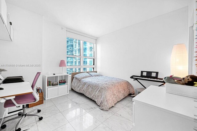 950 Brickell Bay Dr Unit 3605, Miami, FL 33131 - bedroom with marble finish floor