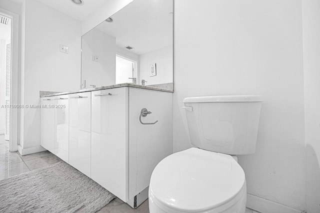 950 Brickell Bay Dr Unit 3605, Miami, FL 33131 - full bath with double vanity, visible vents, and toilet