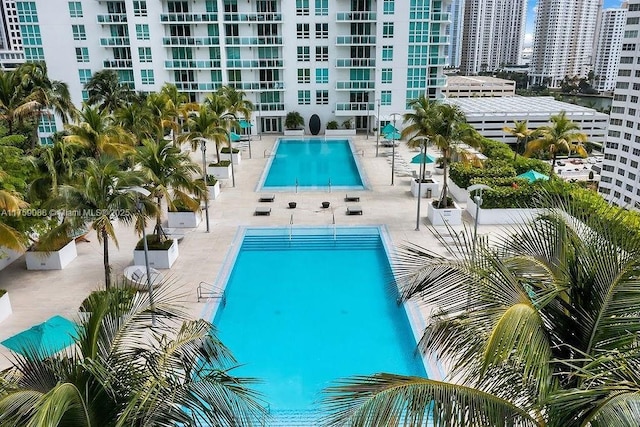 950 Brickell Bay Dr Unit 3605, Miami, FL 33131 - community pool featuring a patio