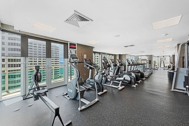 950 Brickell Bay Dr Unit 3605, Miami, FL 33131 - workout area featuring a wall of windows and visible vents