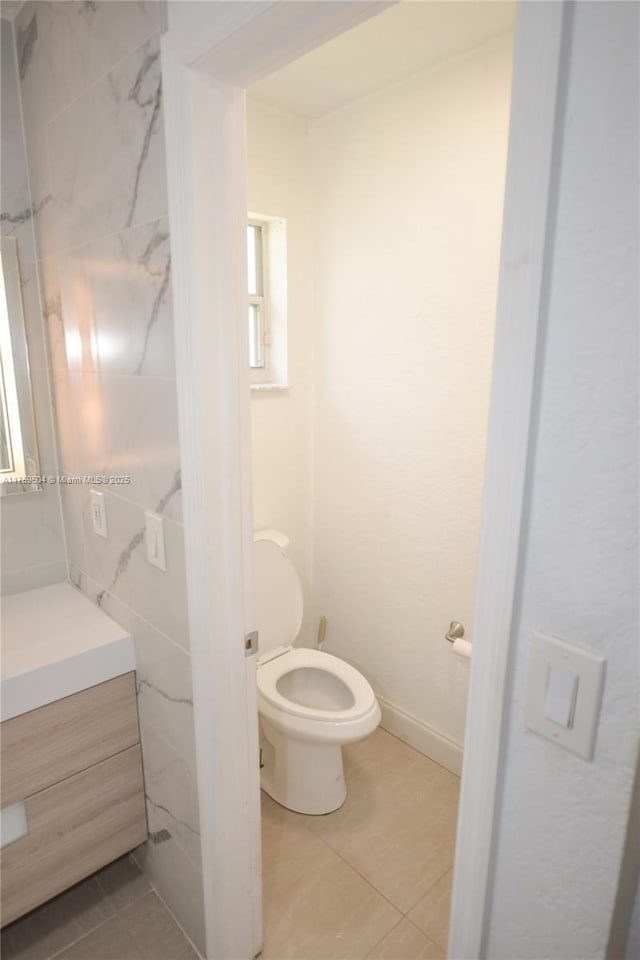 14065 S Cypress Cove Cir, Davie, FL 33325 - bathroom featuring toilet, tile patterned flooring, and vanity