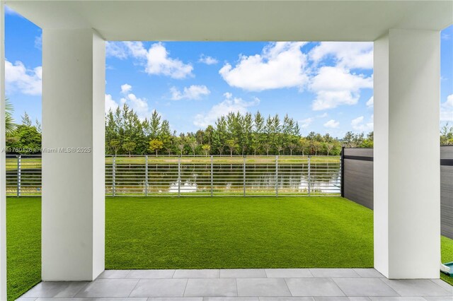 view of yard featuring a balcony