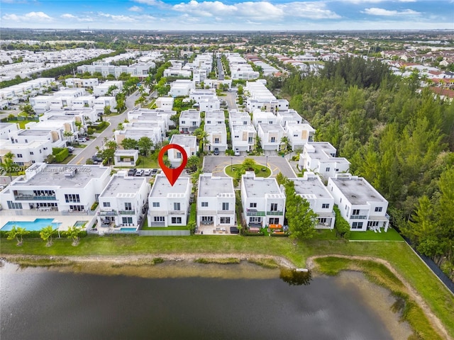 birds eye view of property featuring a residential view and a water view