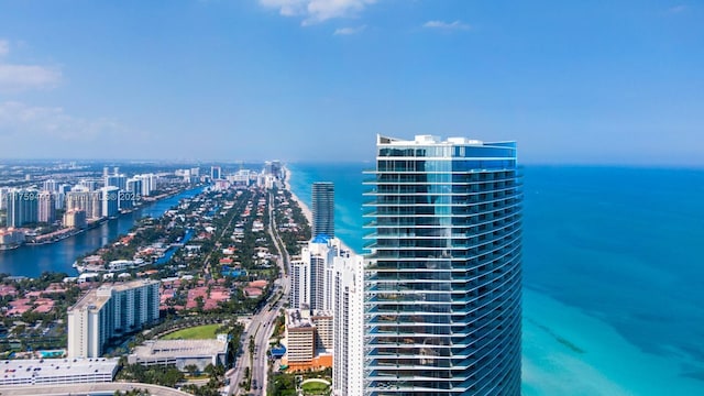 aerial view featuring a city view and a water view