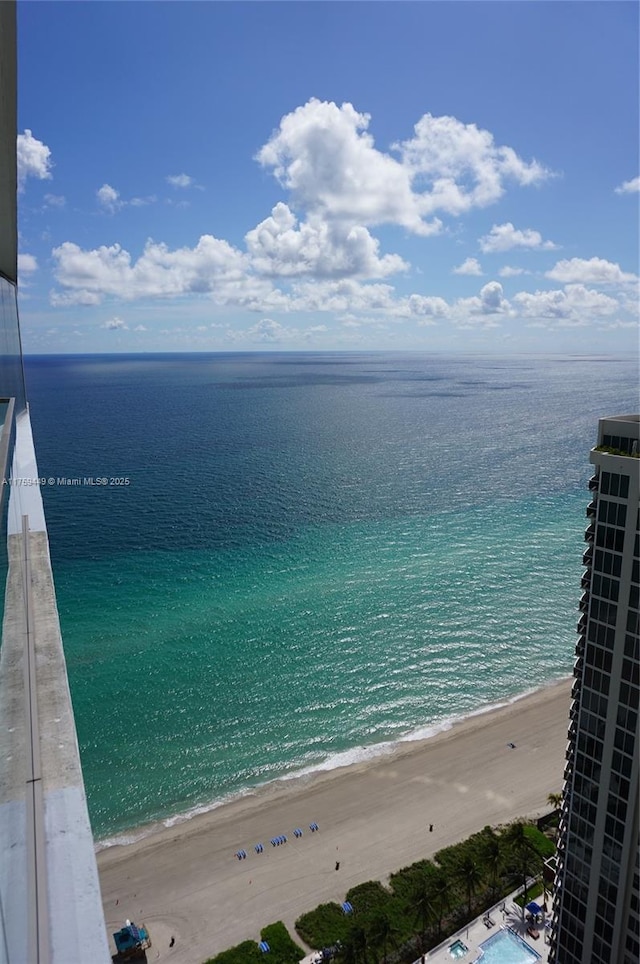 view of water feature with a beach view