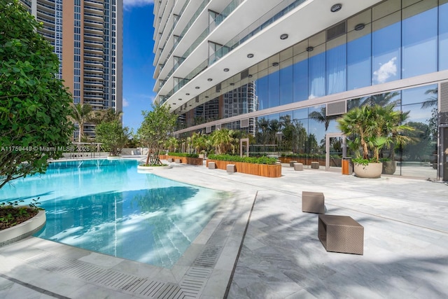 pool with a patio