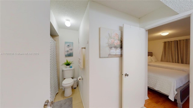15591 SW 105th Ter Unit 524, Miami, FL 33196 - hall featuring light tile patterned flooring and a textured ceiling