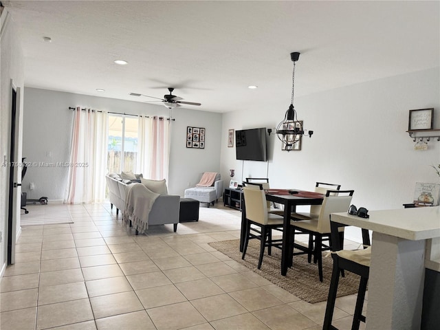 2620 Pierce St Unit A2, Hollywood, FL 33020 - dining area featuring light tile patterned flooring, recessed lighting, ceiling fan, and a chandelier