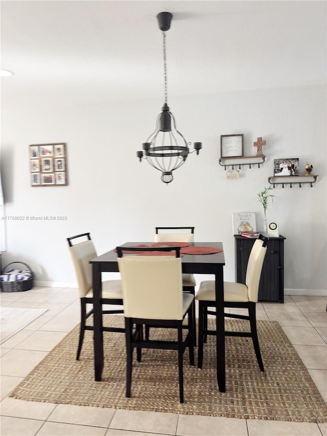 tiled dining area with baseboards