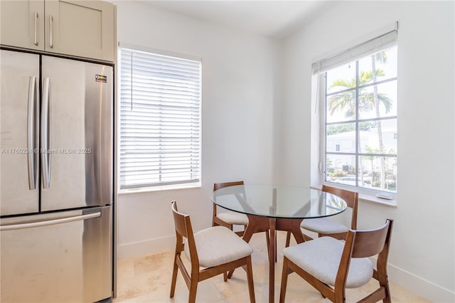 dining room featuring baseboards