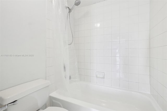 bathroom with toilet and shower / tub combination