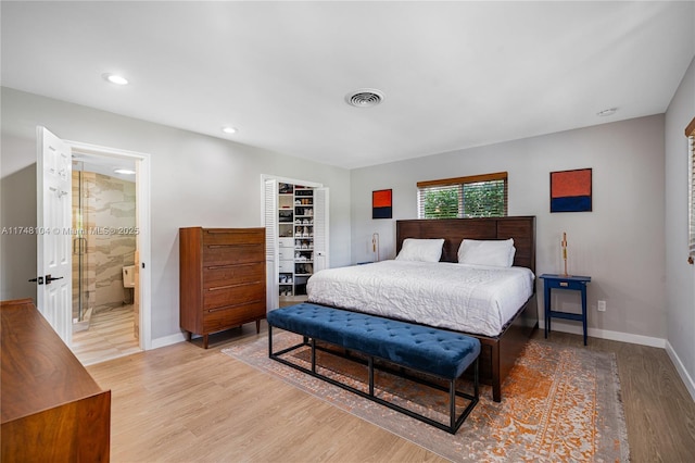 bedroom with recessed lighting, baseboards, visible vents, and light wood-style flooring