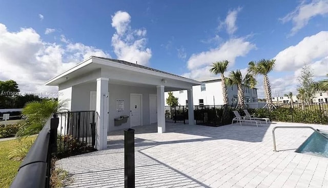 view of patio / terrace with fence