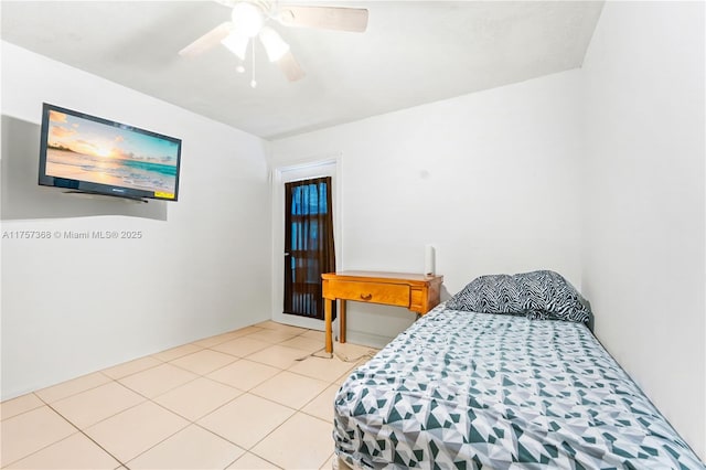 bedroom featuring light tile patterned floors and a ceiling fan