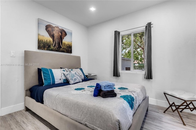 231 NW 44th St, Miami, FL 33127 - bedroom featuring wood finished floors and baseboards
