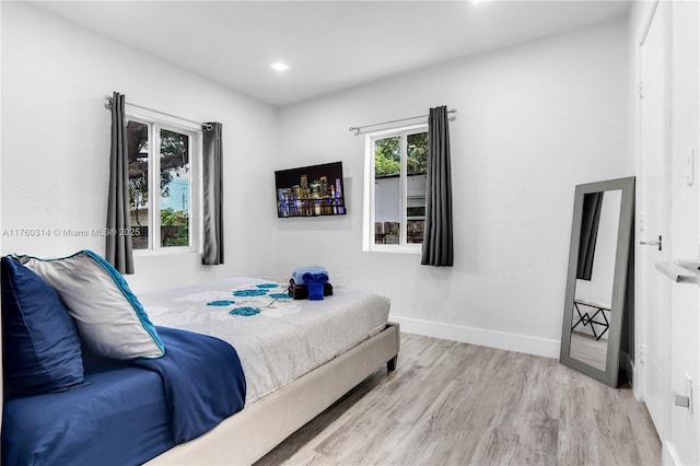 231 NW 44th St, Miami, FL 33127 - bedroom featuring wood finished floors, baseboards, and recessed lighting