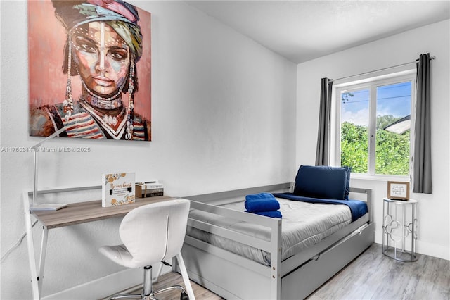231 NW 44th St, Miami, FL 33127 - bedroom with wood finished floors and baseboards