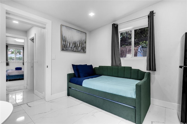 231 NW 44th St, Miami, FL 33127 - bedroom with baseboards and marble finish floors