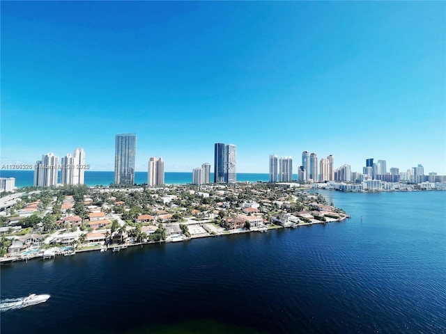 exterior space with a view of city and a water view