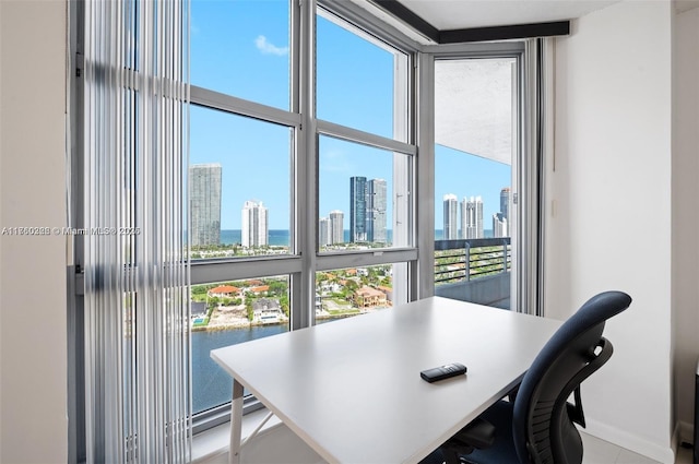 office space with a view of city and expansive windows