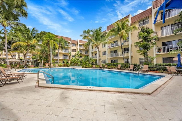 pool with a patio area