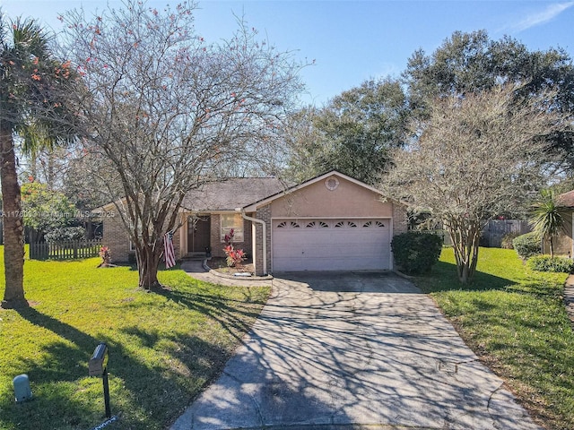 single story home featuring a front yard, an attached garage, fence, and concrete driveway