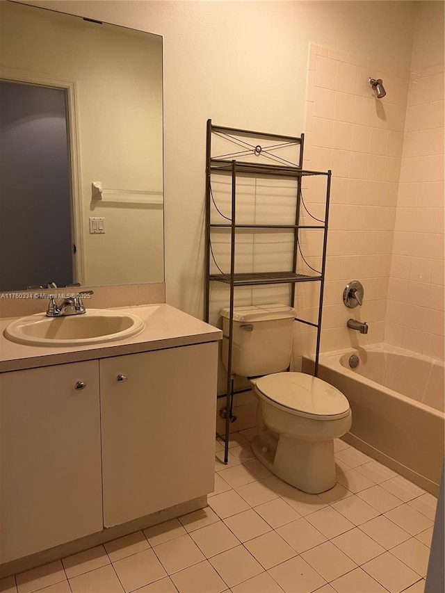 full bathroom featuring vanity,  shower combination, toilet, and tile patterned floors