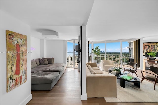 1000 Quayside Ter Unit 1812, Miami, FL 33138 - living room with a wall of windows and wood finished floors