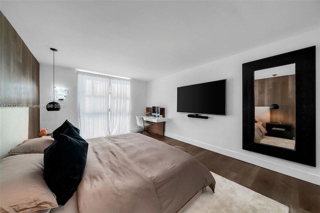 1000 Quayside Ter Unit 1812, Miami, FL 33138 - bedroom featuring baseboards and wood finished floors