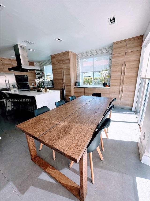 dining space with visible vents