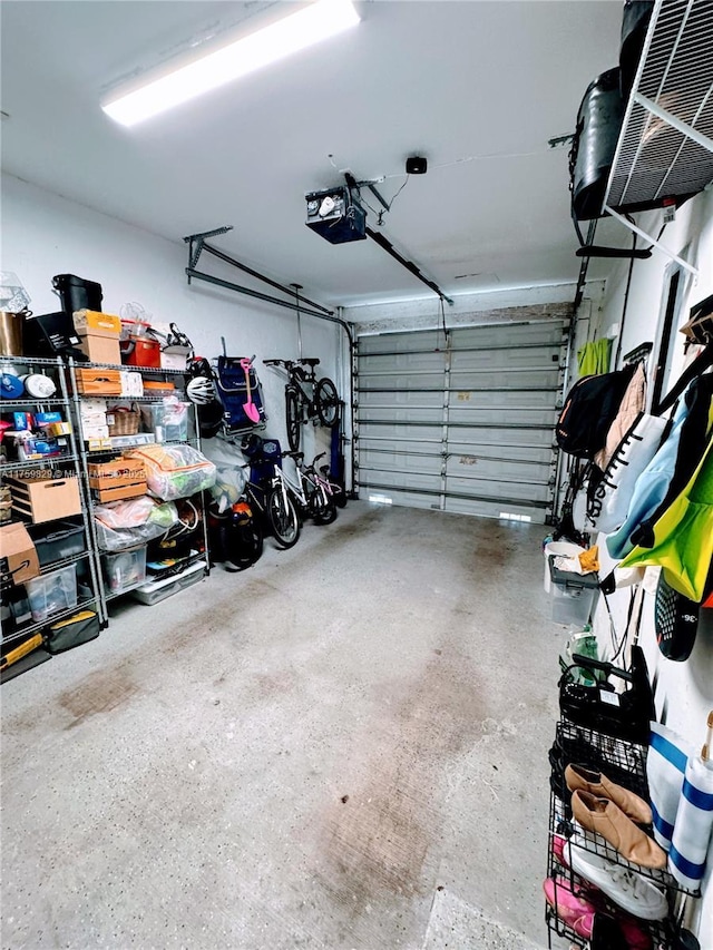 garage featuring a garage door opener