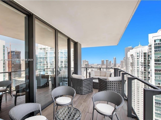 balcony featuring a city view