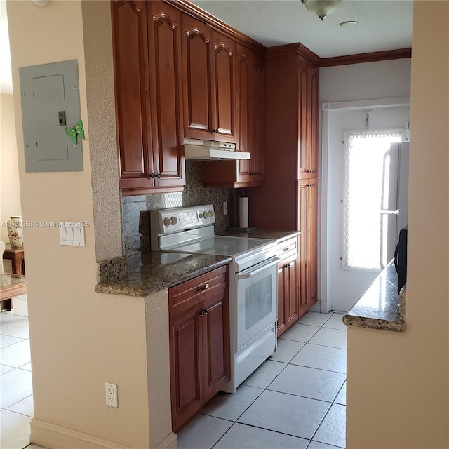 kitchen with under cabinet range hood, light tile patterned floors, electric panel, refrigerator, and white electric range