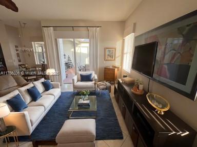 living area featuring tile patterned flooring