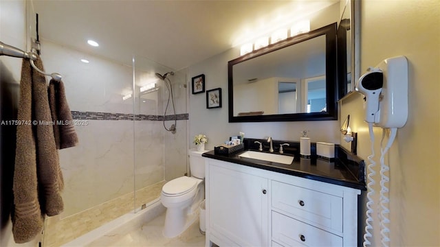 full bathroom with vanity, a shower stall, toilet, and recessed lighting