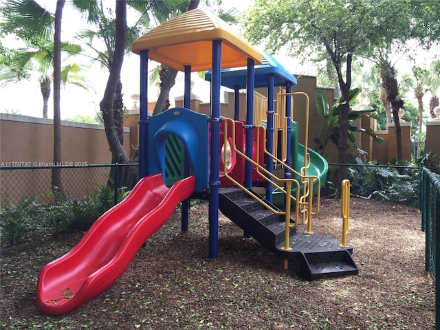 community jungle gym with fence