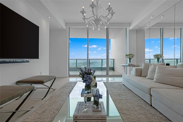 living room with recessed lighting, a notable chandelier, floor to ceiling windows, and crown molding