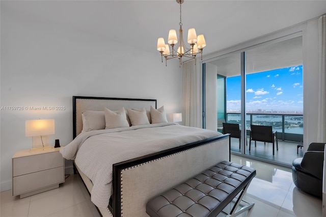 bedroom featuring light tile patterned floors, a notable chandelier, floor to ceiling windows, and access to outside