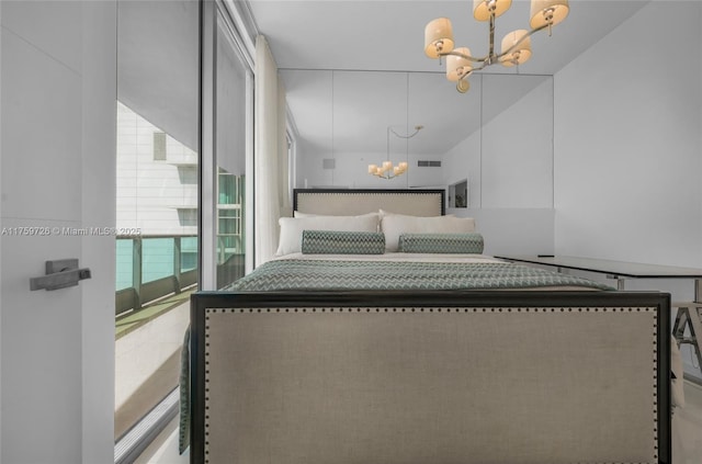 bedroom featuring a chandelier and visible vents