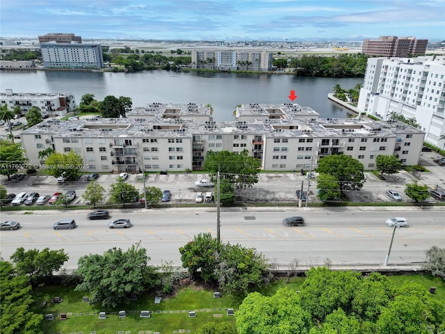 bird's eye view featuring a view of city and a water view