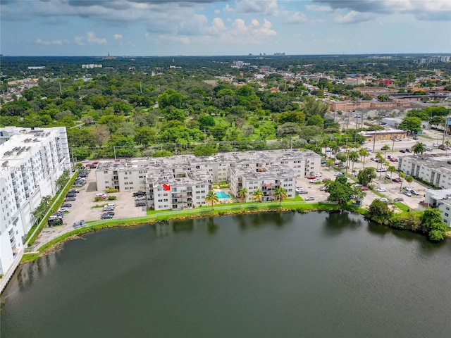 bird's eye view featuring a water view and a view of city