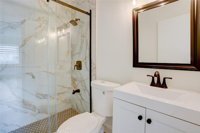 bathroom with vanity, toilet, and a marble finish shower