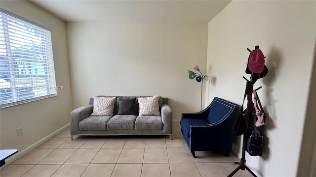 2462 SE 15th Pl Unit 339, Homestead, FL 33035 - sitting room with light tile patterned floors and baseboards