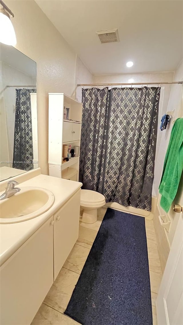 2462 SE 15th Pl Unit 339, Homestead, FL 33035 - bathroom featuring shower / bath combo with shower curtain, toilet, marble finish flooring, recessed lighting, and vanity
